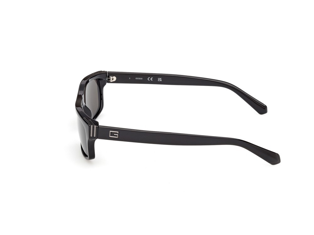 Occhiali da sole Guess GU00276 (01A) colore nero lucido forma rettangolare lenti fumo