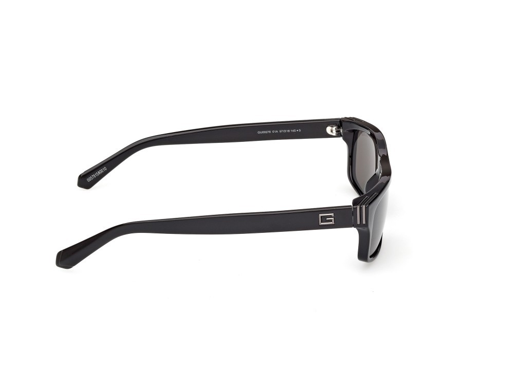 Occhiali da sole Guess GU00276 (01A) colore nero lucido forma rettangolare lenti fumo