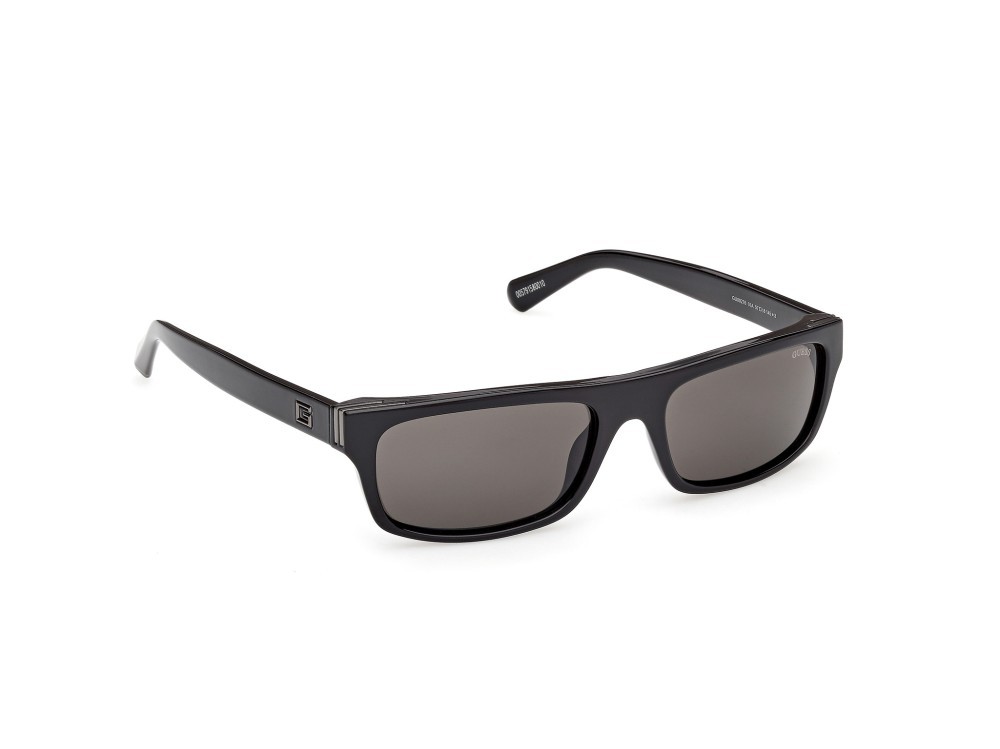 Occhiali da sole Guess GU00276 (01A) colore nero lucido forma rettangolare lenti fumo