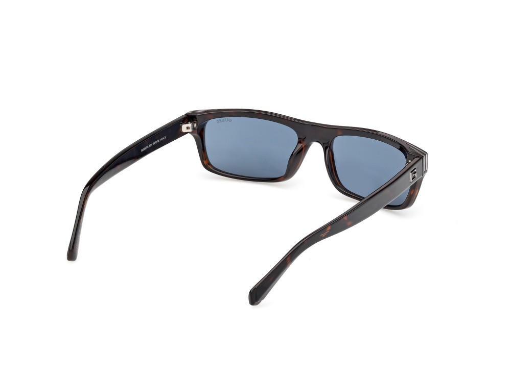 Occhiali da sole Guess GU00276 (52V) colore avana scura forma rettangolare lenti blu