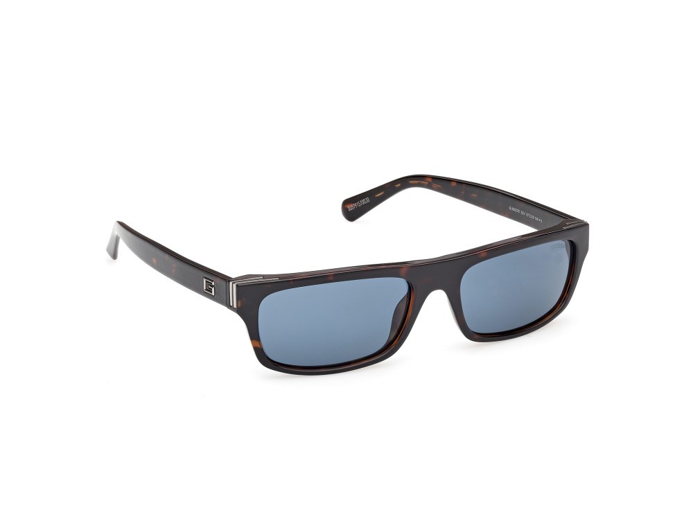 Occhiali da sole Guess GU00276 (52V) colore avana scura forma rettangolare lenti blu