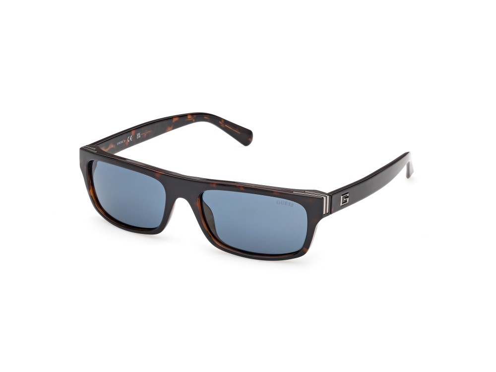 Occhiali da sole Guess GU00276 (52V) colore avana scura forma rettangolare lenti blu