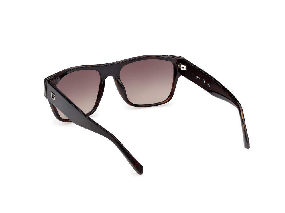 Occhiali da sole Guess GU00277 (52F) colore avana scura forma quadrato lenti marrone sfumato