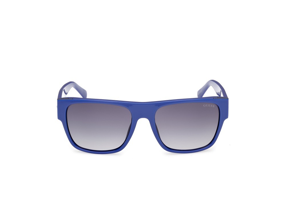 Occhiali da sole Guess GU00277 (90B) colore blu lucido forma quadrato lenti fumo grad.