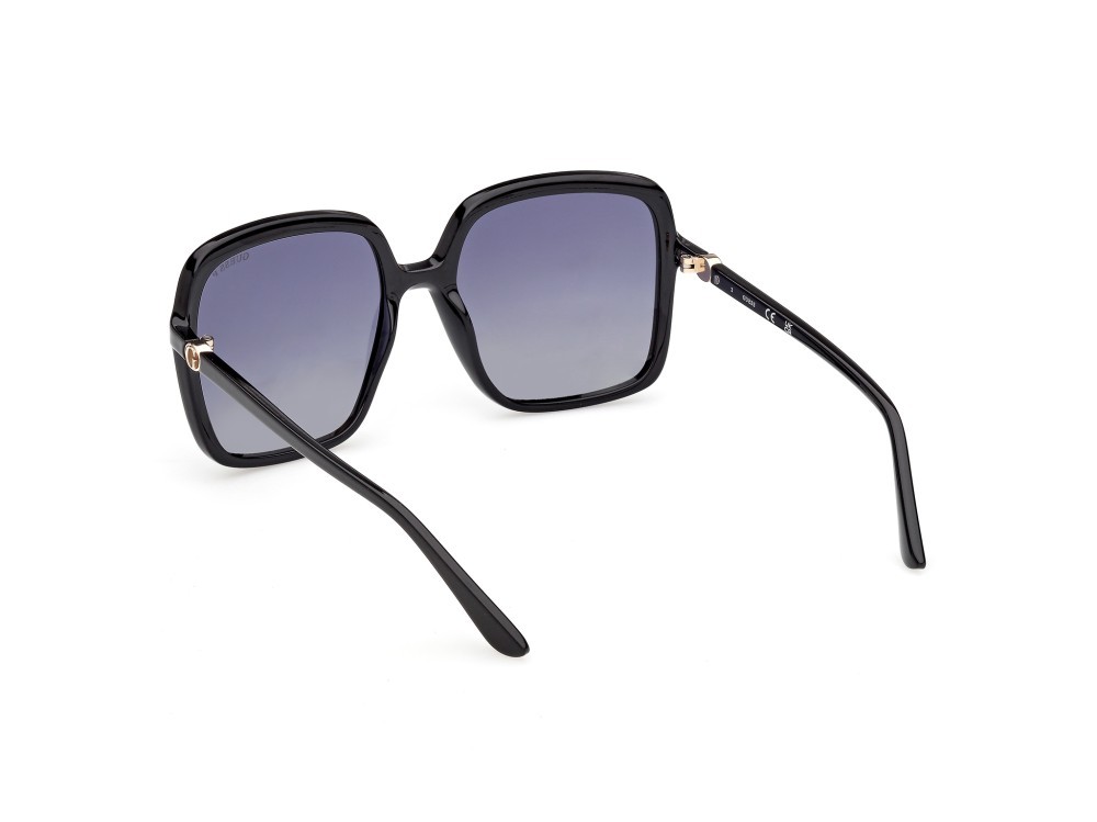 Occhiali da sole Guess GU00280 (01D) colore nero lucido forma quadrato lenti fumo polar.