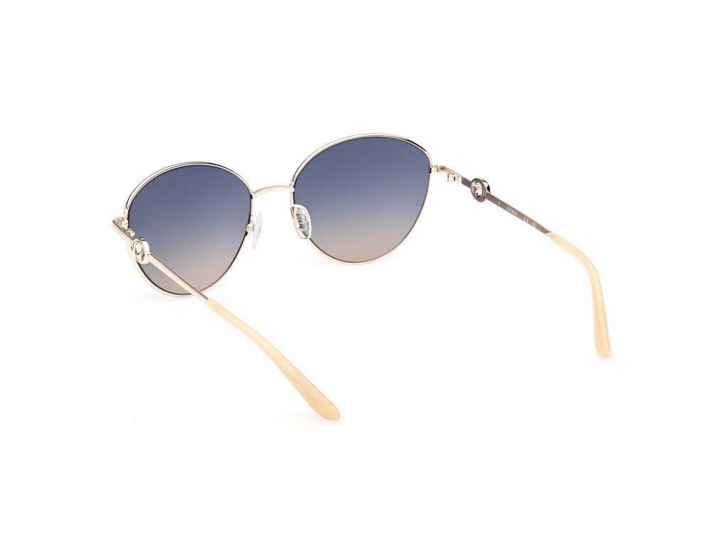 Occhiali da sole Guess GU00284 (32W) colore oro pallido lucido forma rotondo lenti blu sfumato