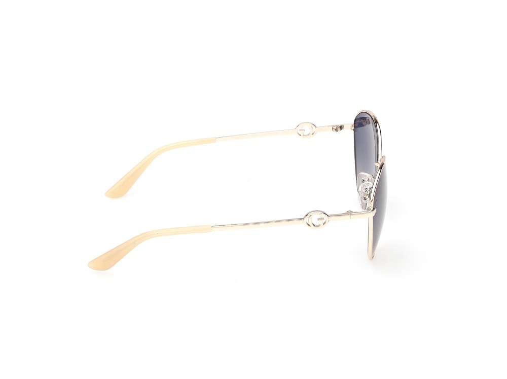 Occhiali da sole Guess GU00284 (32W) colore oro pallido lucido forma rotondo lenti blu sfumato