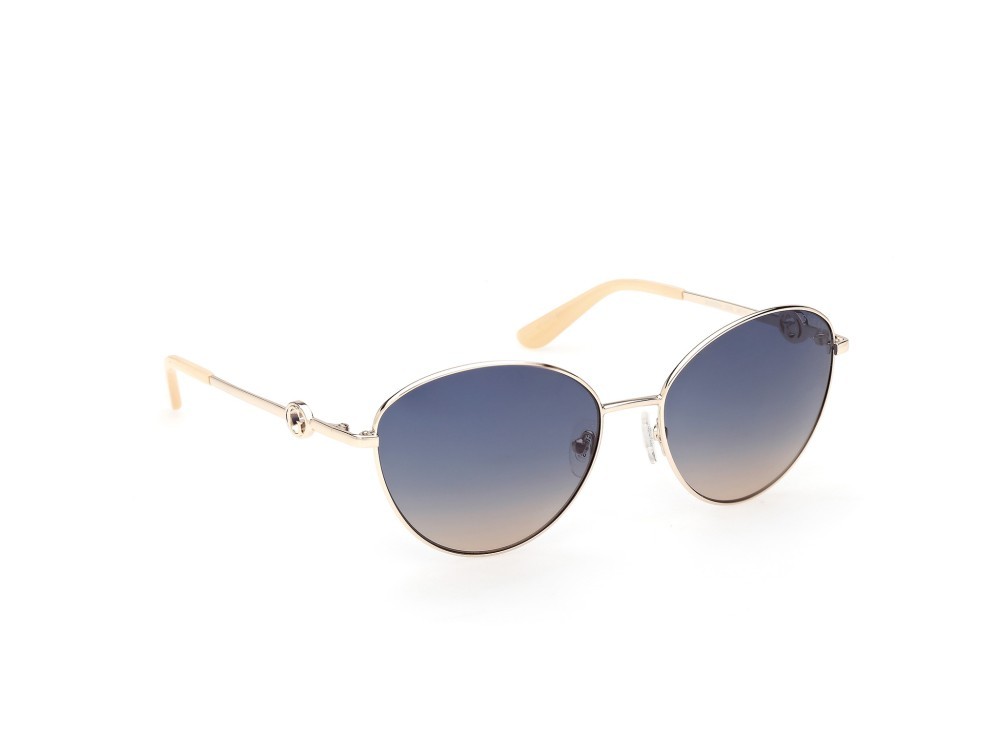Occhiali da sole Guess GU00284 (32W) colore oro pallido lucido forma rotondo lenti blu sfumato