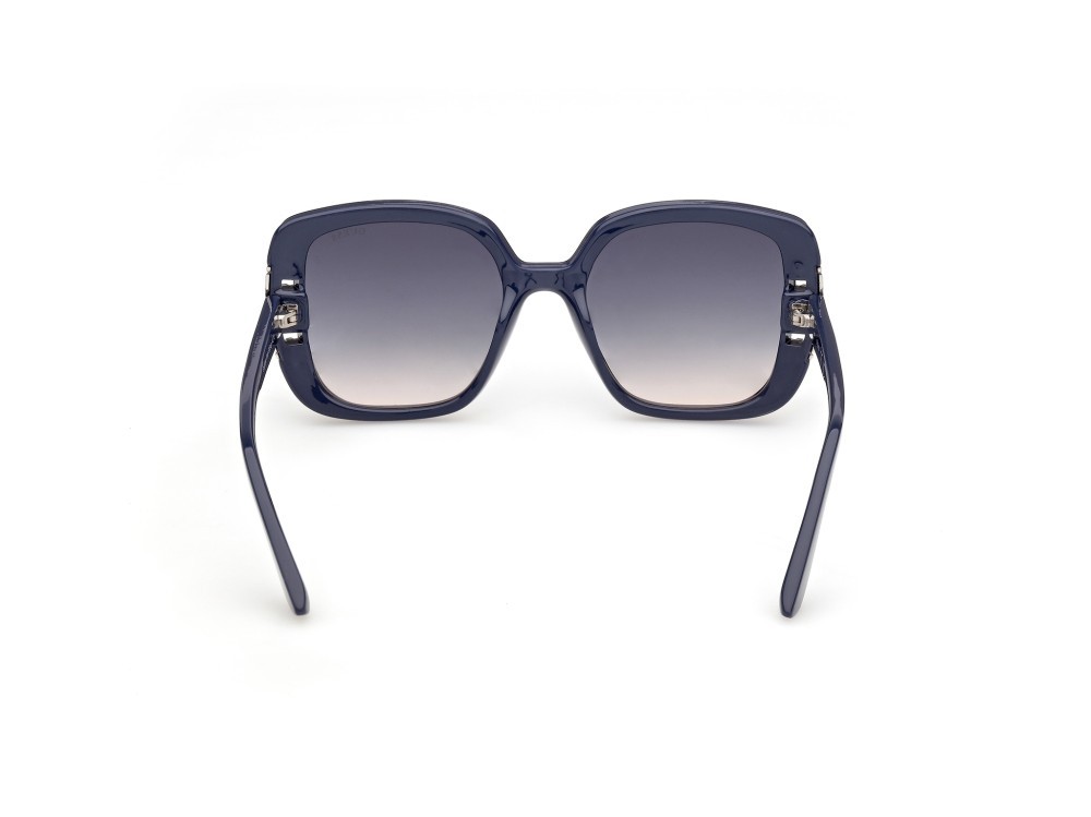 Occhiali da sole Guess GU00294 (90W) colore blu lucido forma quadrato lenti blu sfumato