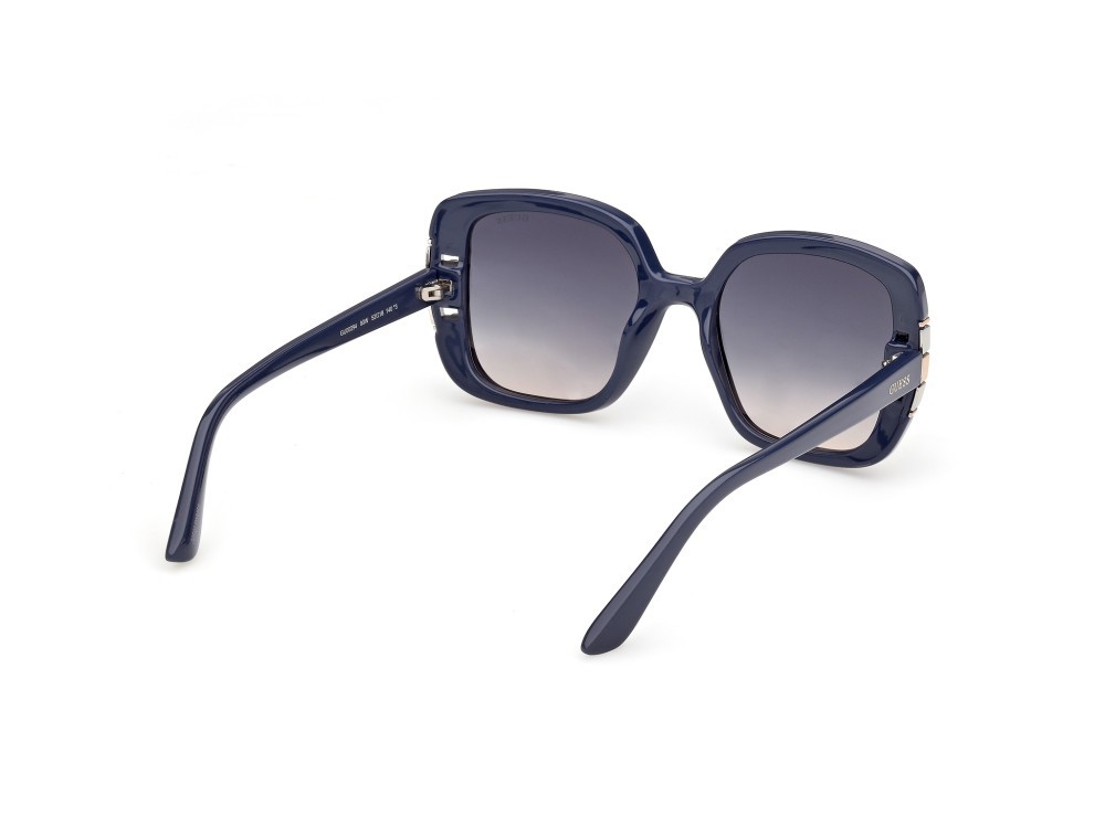 Occhiali da sole Guess GU00294 (90W) colore blu lucido forma quadrato lenti blu sfumato