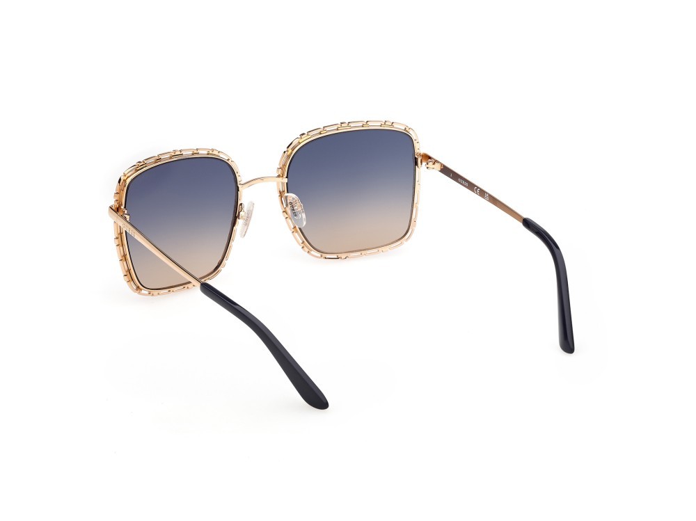 Occhiali da sole Guess GU00296 (32W) colore oro endura lucido forma quadrato lenti blu sfumato