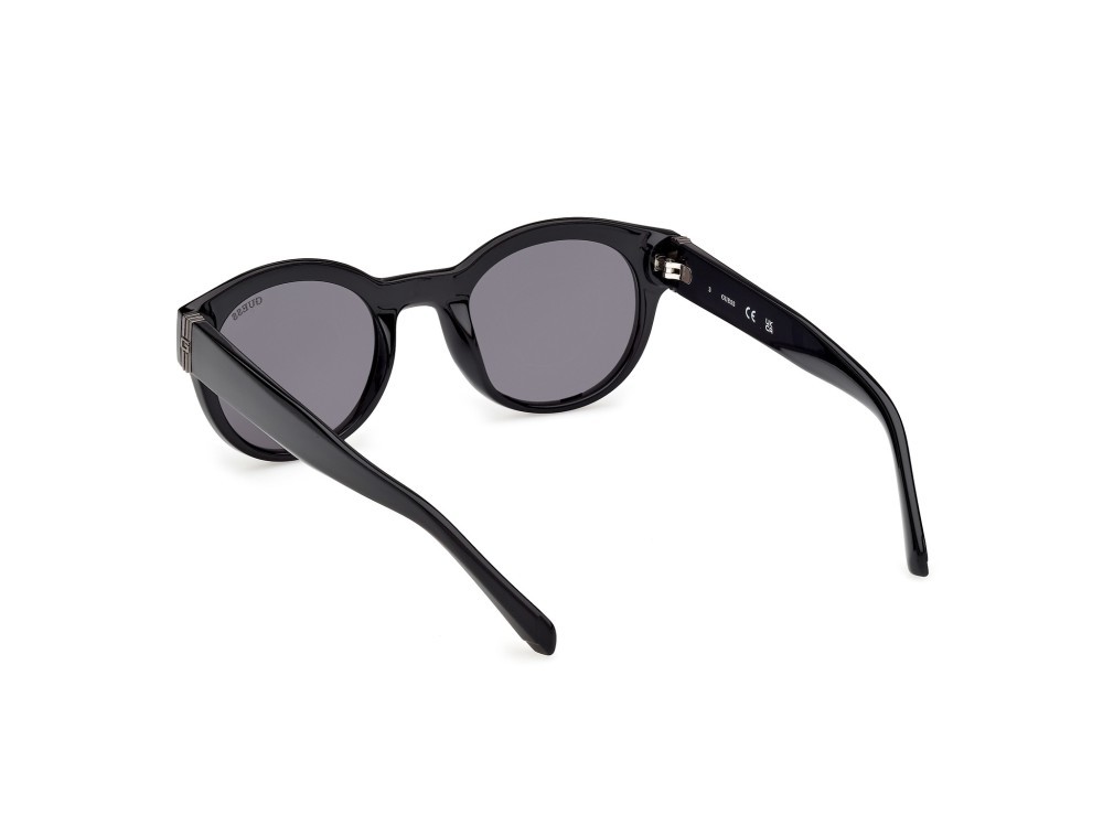 Occhiali da sole Guess GU00298 (01A) colore nero lucido  forma rotondo lenti fumo