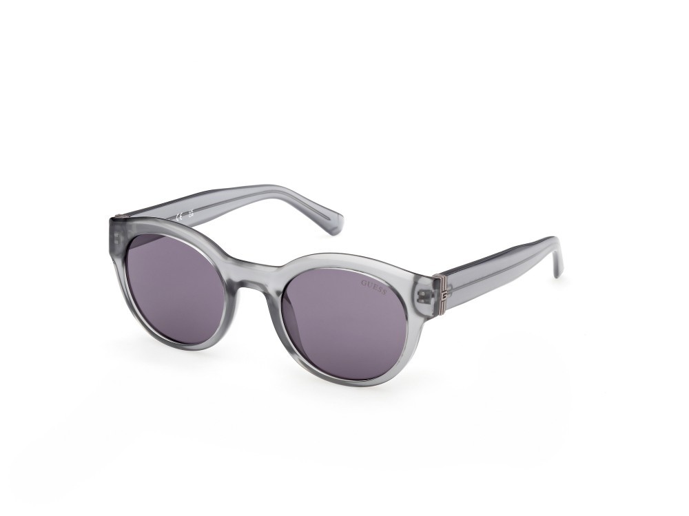 Occhiali da sole Guess GU00298 (20Y) colore grigio lucido forma rotondo lenti viola