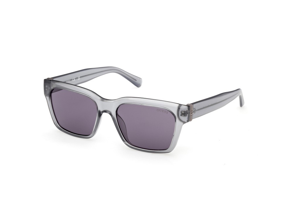 Occhiali da sole Guess GU00299 (20Y) colore grigio lucido forma quadrato lenti viola