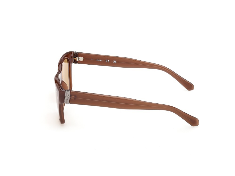 Occhiali da sole Guess GU00299 (50E) colore marrone scuro lucido forma quadrato lenti marrone