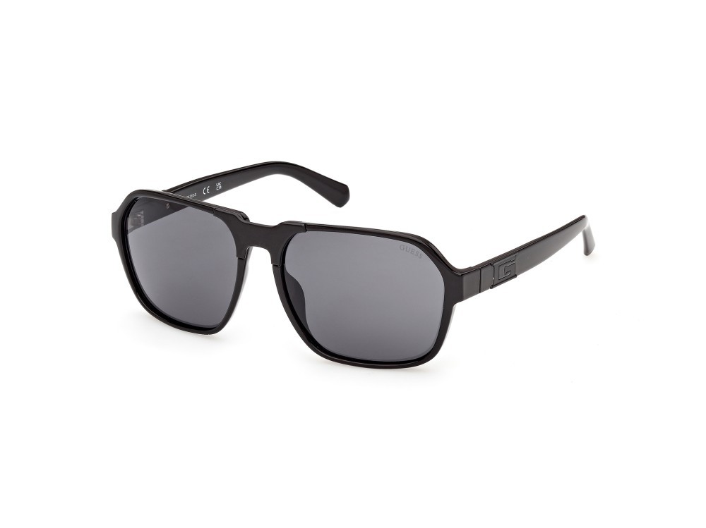 Occhiali da sole Guess GU00302 (01A) colore  nero lucido forma quadrato lenti fumo