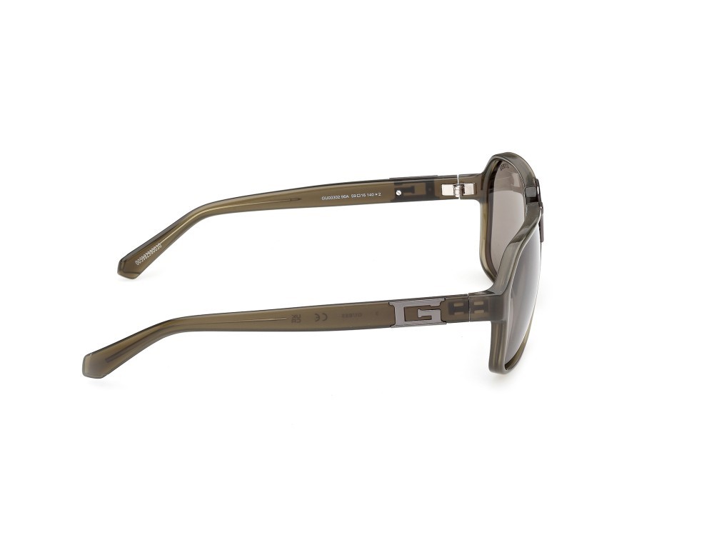 Occhiali da sole Guess GU00302 (96A) colore verde scuro lucido  forma quadrato lenti fumo
