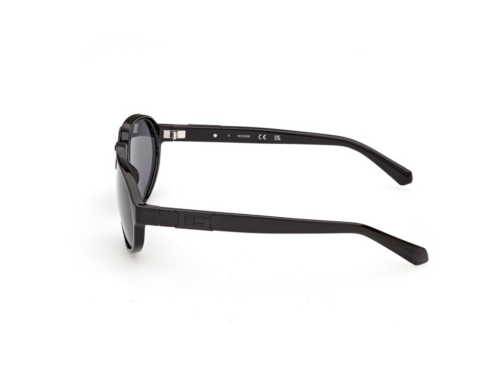 Occhiali da sole Guess GU00303 (01A) colore nero lucido forma aviator lenti fumo 