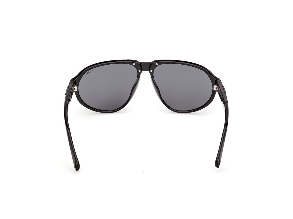 Occhiali da sole Guess GU00303 (01A) colore nero lucido forma aviator lenti fumo 