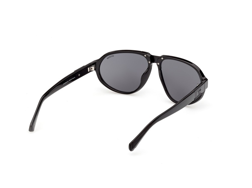 Occhiali da sole Guess GU00303 (01A) colore nero lucido forma aviator lenti fumo 