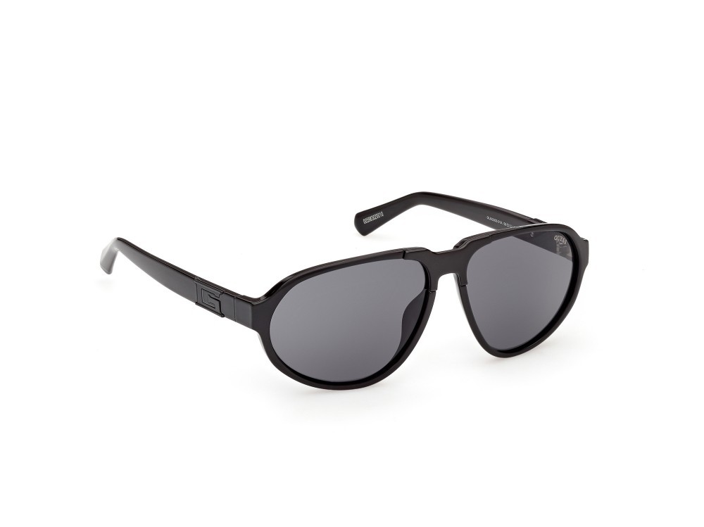 Occhiali da sole Guess GU00303 (01A) colore nero lucido forma aviator lenti fumo 