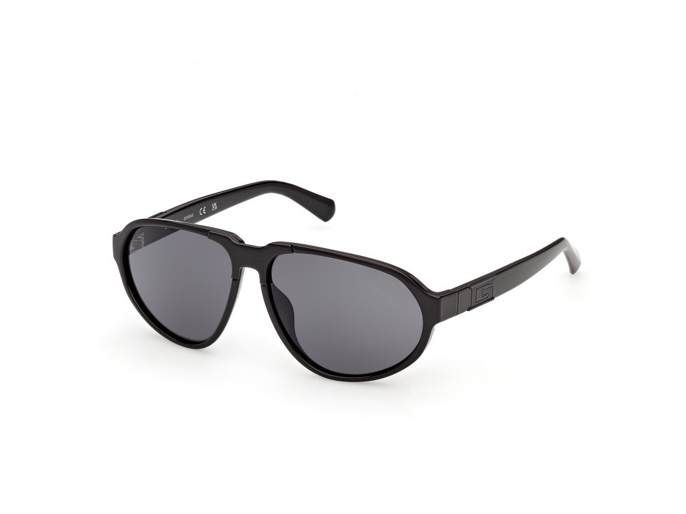 Occhiali da sole Guess GU00303 (01A) colore nero lucido forma aviator lenti fumo 