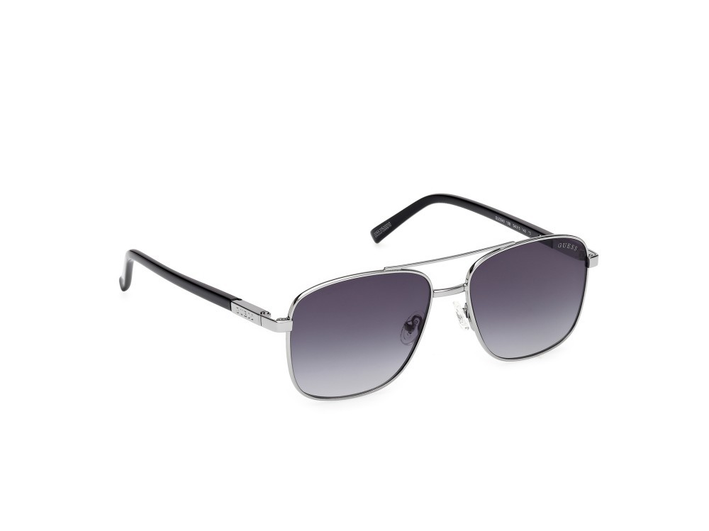 Occhiali da sole Guess GU3040 (10B) colore rutenio chiaro lucido forma navigator lenti fumo grad.