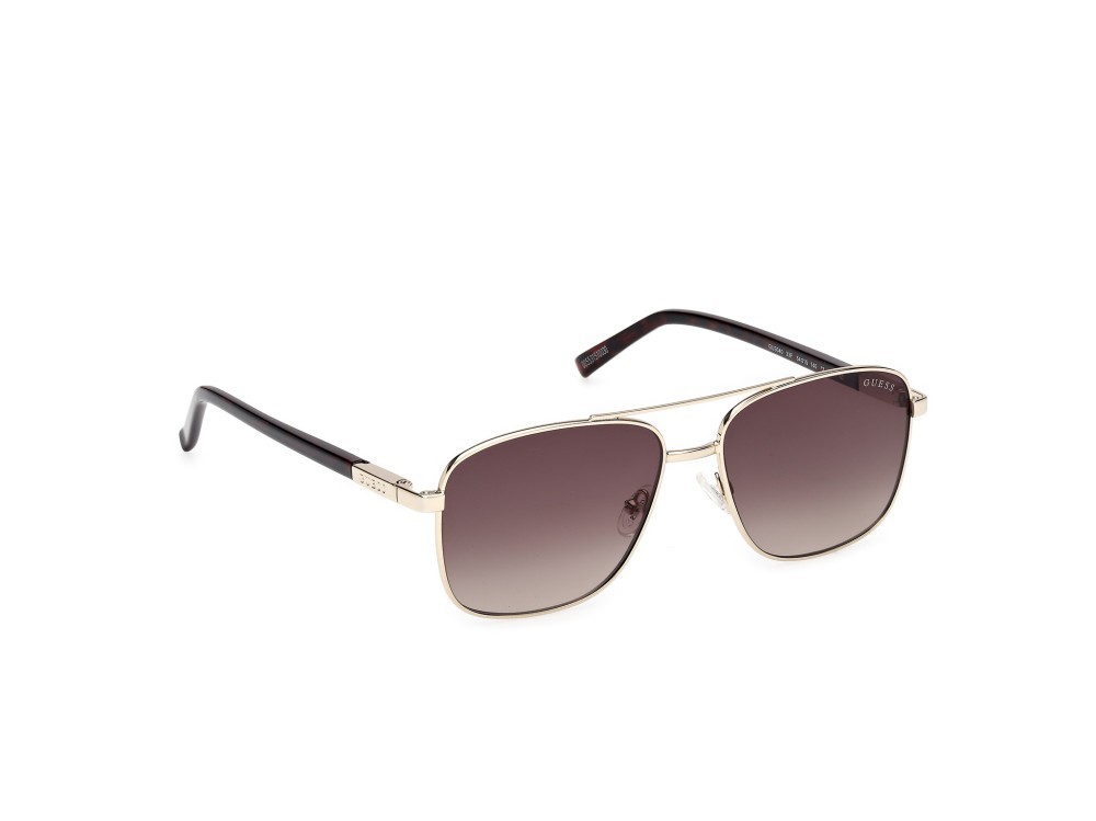 Occhiali da sole Guess GU3040 (33F) colore oro pallido lucido  forma navigator lenti marrone sfumato