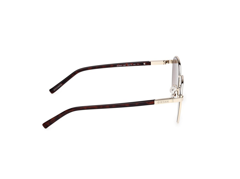Occhiali da sole Guess GU3041 (33F) colore oro pallido lucido forma rotondo lenti marrone sfumato