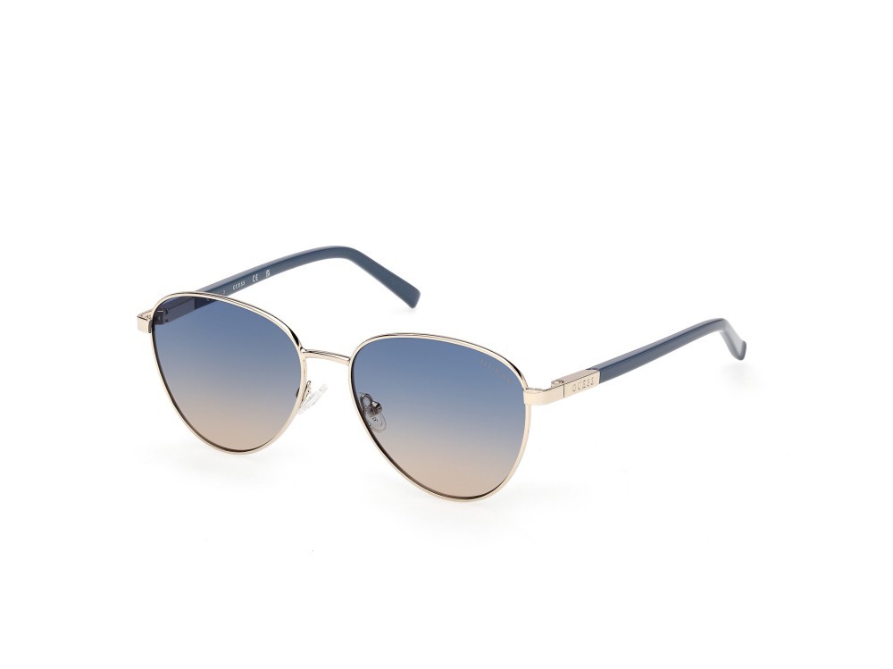 Occhiali da sole Guess GU3041 (33W) colore oro pallido lucido forma rotondo lenti blu sfumato