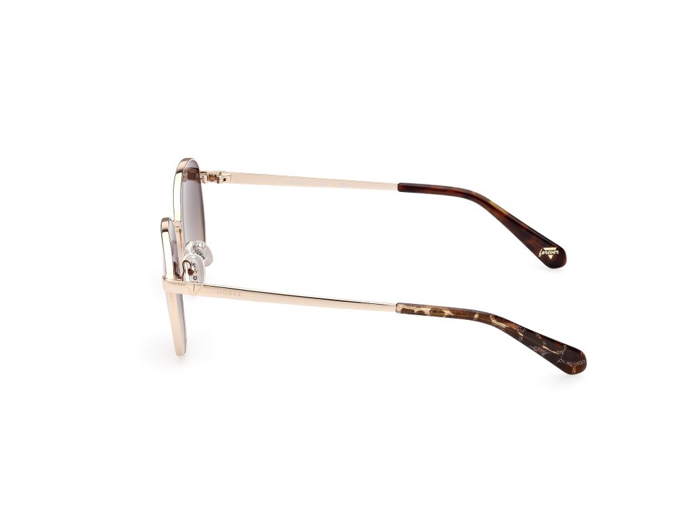 Occhiali da sole Guess GU5214 (32F) colore oro  forma rotondo lenti marrone grad.