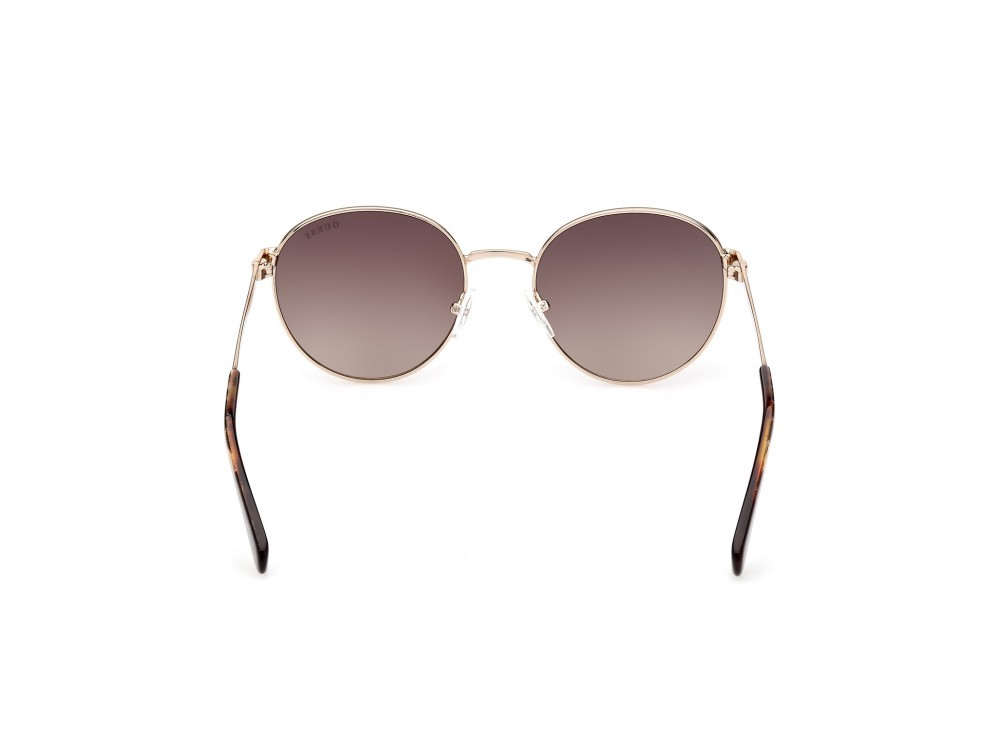 Occhiali da sole Guess GU5214 (32F) colore oro  forma rotondo lenti marrone grad.