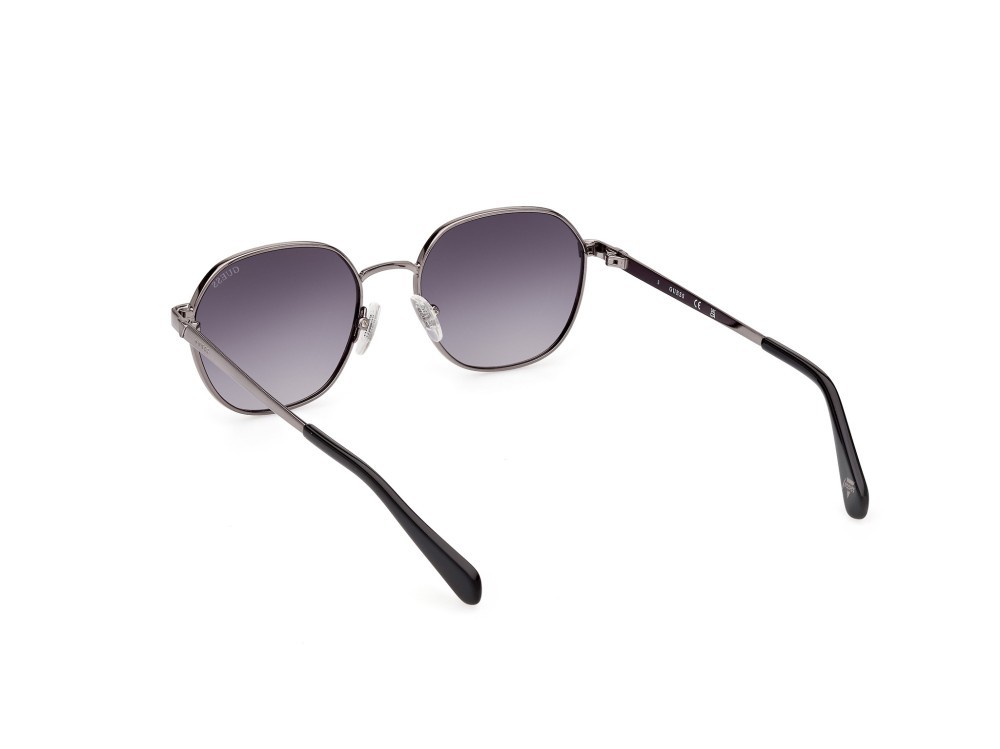 Occhiali da sole Guess GU5215 (06B) colore nichel stagno scuro lucido forma geometrico lenti fumo grad.