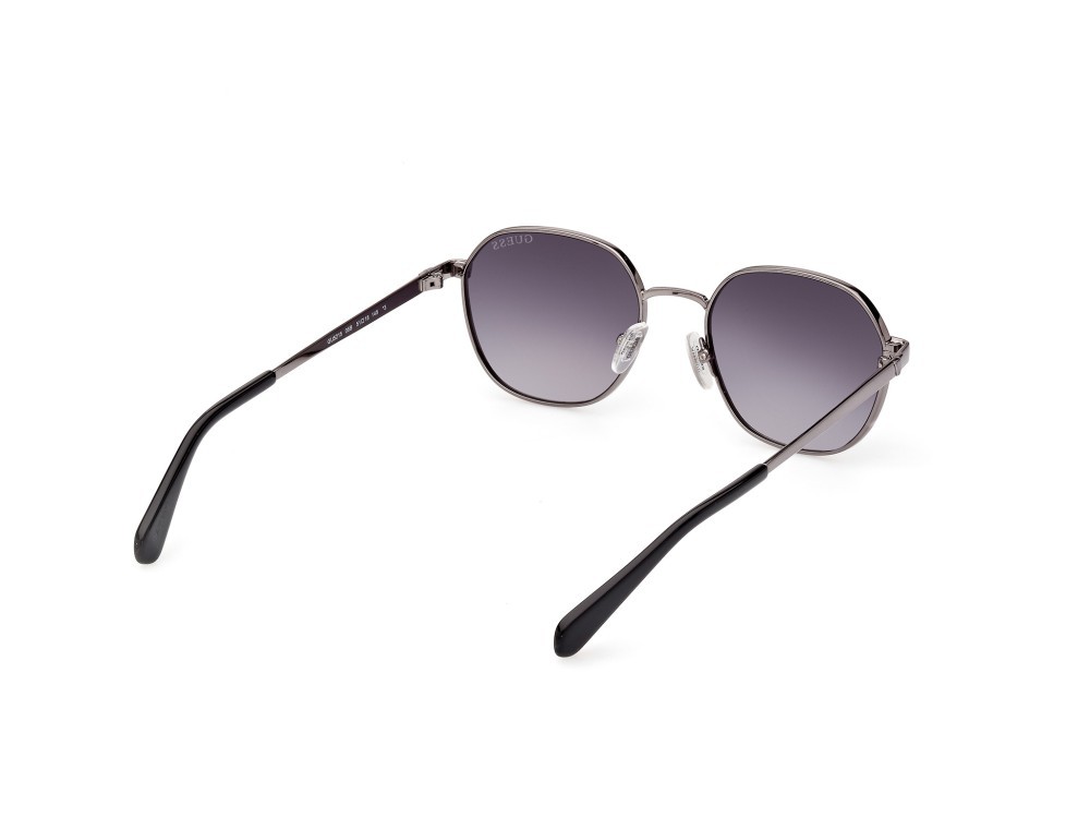 Occhiali da sole Guess GU5215 (06B) colore nichel stagno scuro lucido forma geometrico lenti fumo grad.