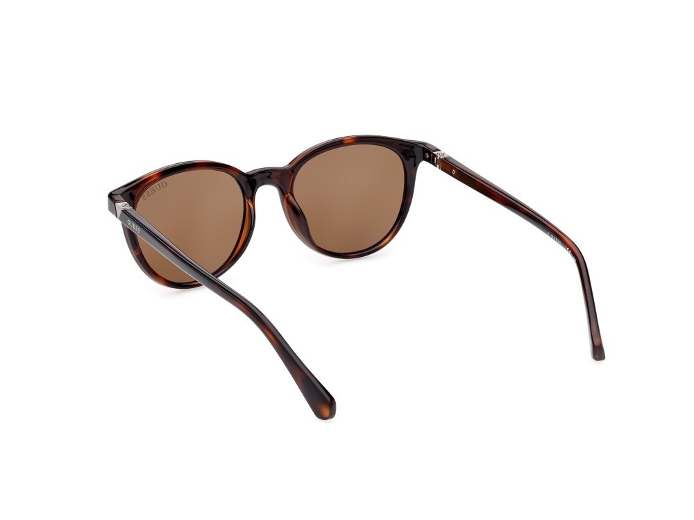 Occhiali da sole Guess GU5216 (52H) colore avana scura forma rotondo lenti marrone polar.