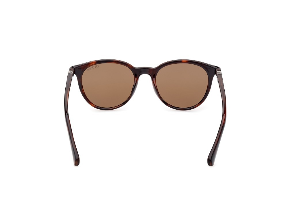 Occhiali da sole Guess GU5216 (52H) colore avana scura forma rotondo lenti marrone polar.