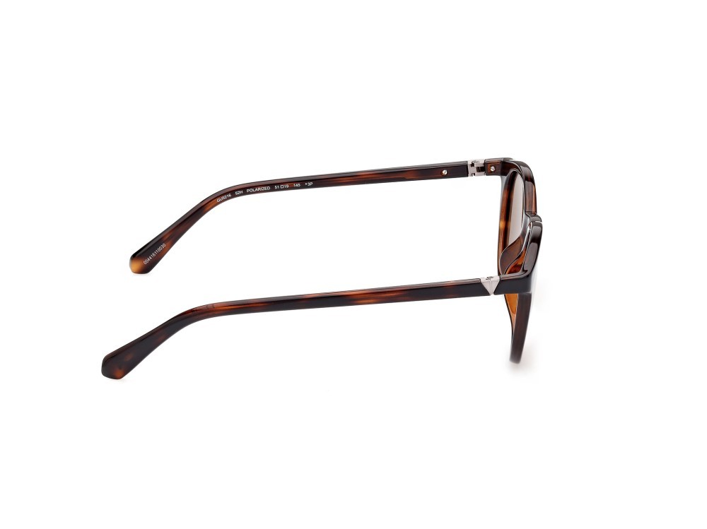 Occhiali da sole Guess GU5216 (52H) colore avana scura forma rotondo lenti marrone polar.