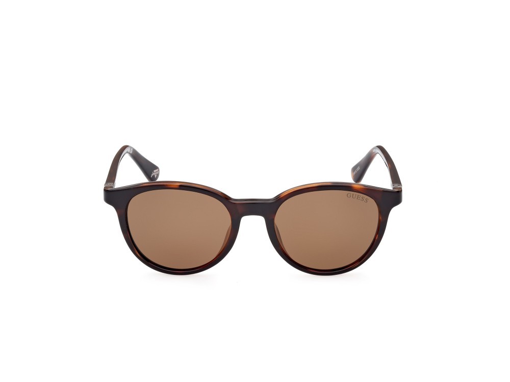 Occhiali da sole Guess GU5216 (52H) colore avana scura forma rotondo lenti marrone polar.