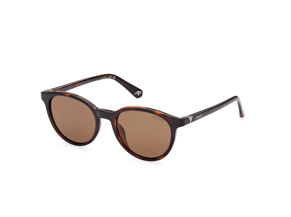 Occhiali da sole Guess GU5216 (52H) colore avana scura forma rotondo lenti marrone polar.