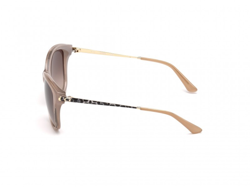 Occhiali da sole Guess GU7469 (57F) colore beige lucido forma geometrico lenti marrone grad.