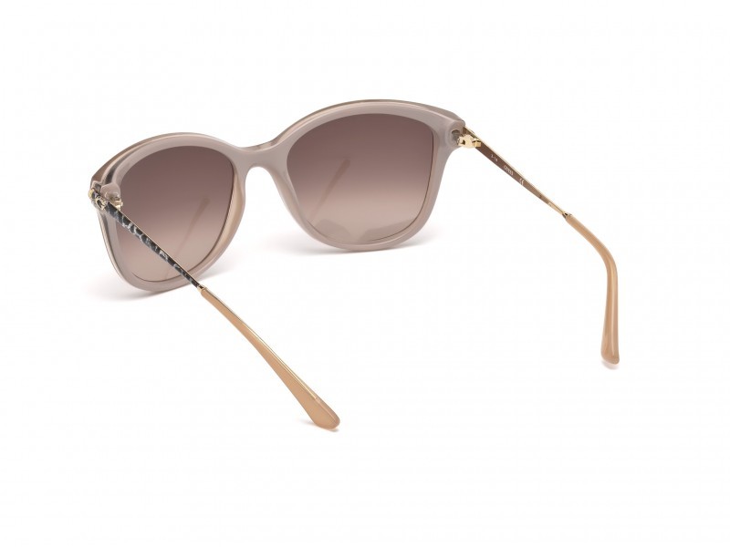 Occhiali da sole Guess GU7469 (57F) colore beige lucido forma geometrico lenti marrone grad.