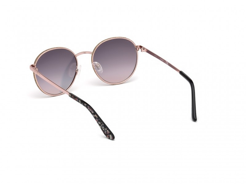 Occhiali da sole Guess GU7556 (28U) colore oro rosé lucido forma rotondo lenti bordeaux specchiato