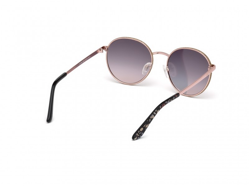 Occhiali da sole Guess GU7556 (28U) colore oro rosé lucido forma rotondo lenti bordeaux specchiato