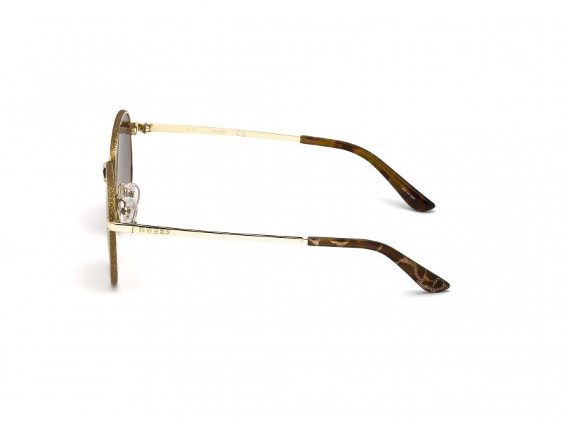 Occhiali da sole Guess GU7556 (32F) colore oro forma rotondo lenti marrone grad.