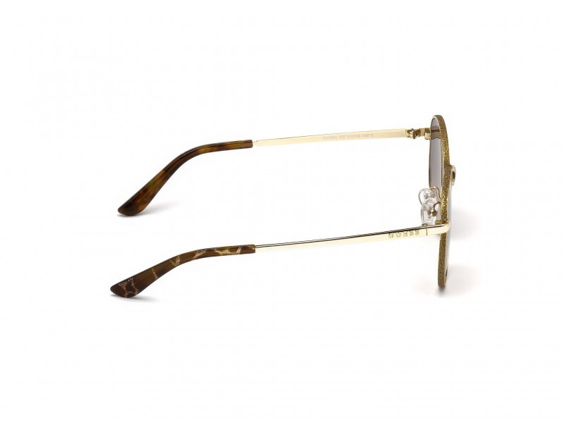 Occhiali da sole Guess GU7556 (32F) colore oro forma rotondo lenti marrone grad.
