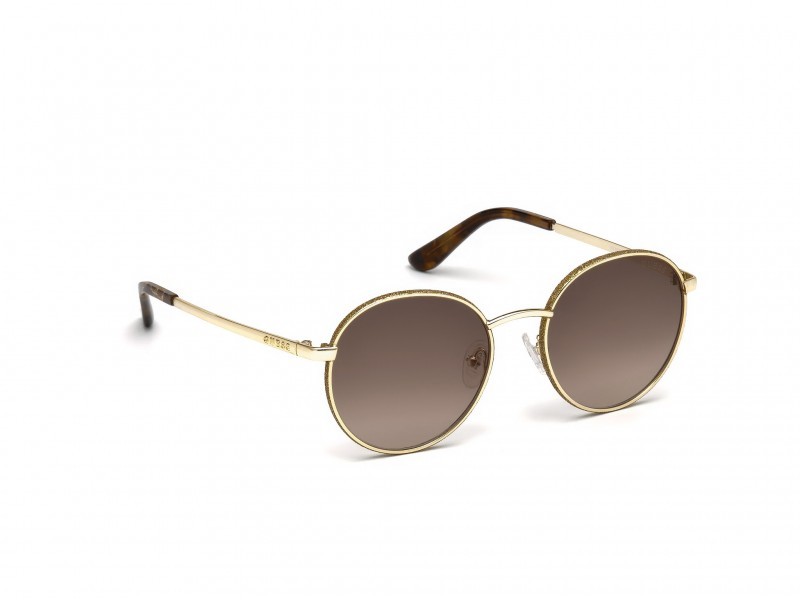 Occhiali da sole Guess GU7556 (32F) colore oro forma rotondo lenti marrone grad.