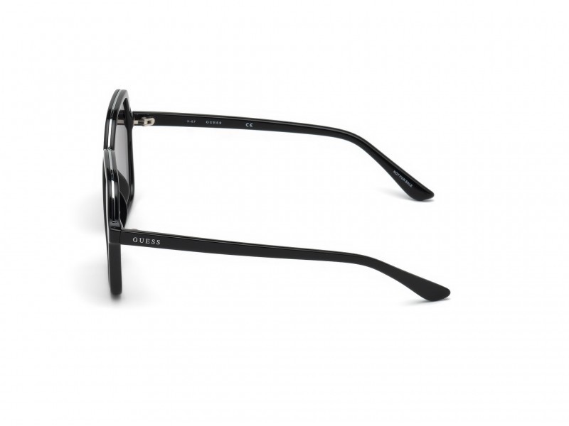 Occhiali da sole Guess GU7557 (01B) colore nero lucido forma geometrico lenti fumo grad.