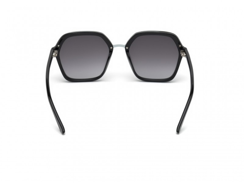 Occhiali da sole Guess GU7557 (01B) colore nero lucido forma geometrico lenti fumo grad.