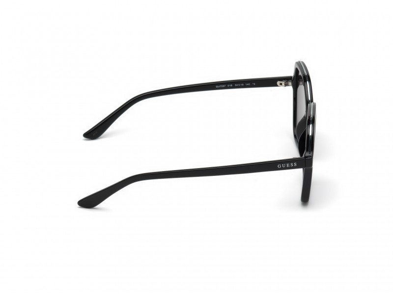 Occhiali da sole Guess GU7557 (01B) colore nero lucido forma geometrico lenti fumo grad.