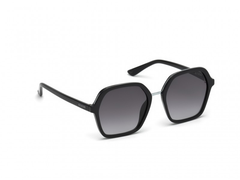 Occhiali da sole Guess GU7557 (01B) colore nero lucido forma geometrico lenti fumo grad.